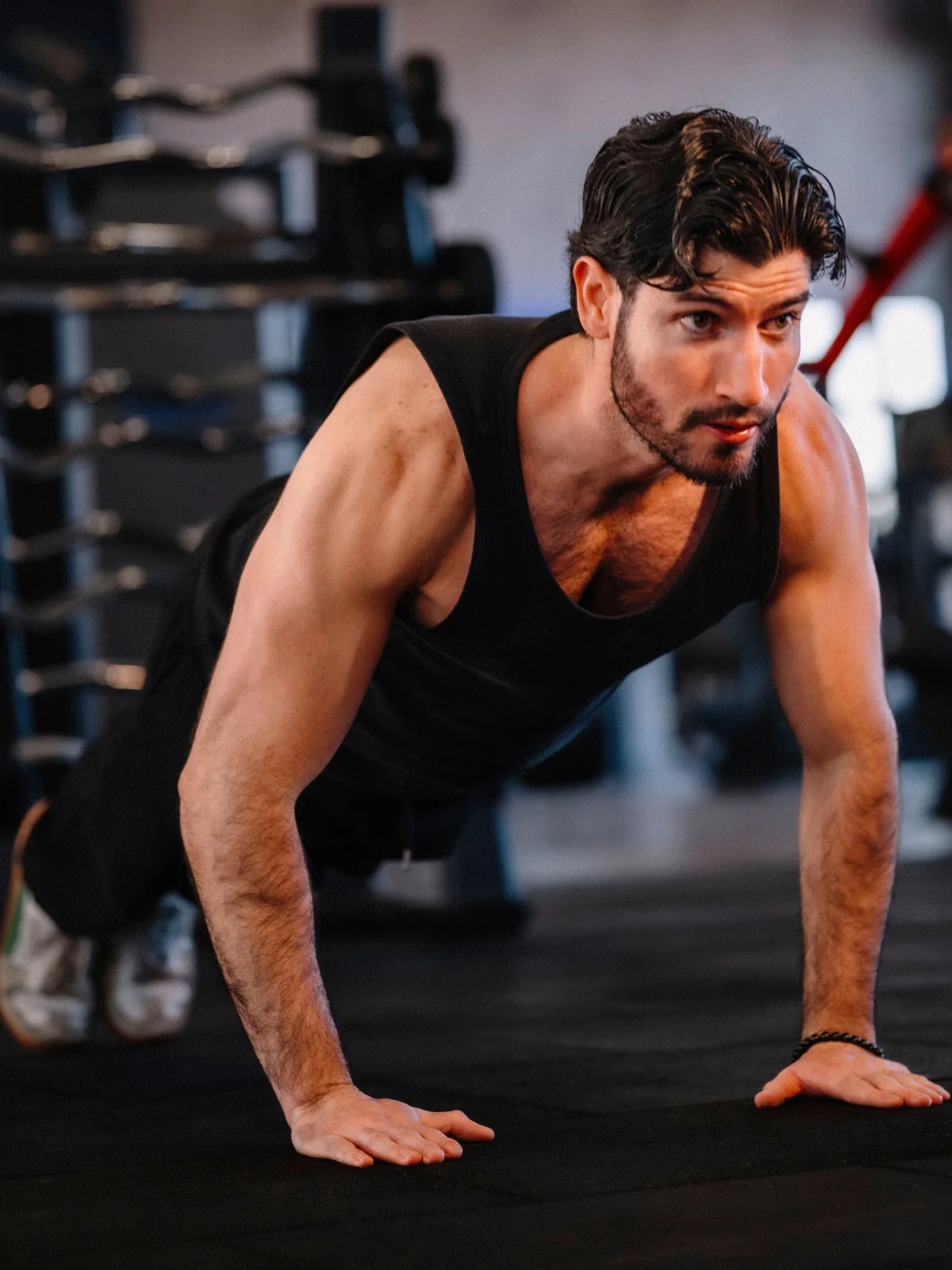 Man strength training with intention at the gym